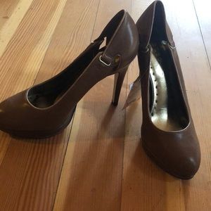 Brown leather heels with gold buckle